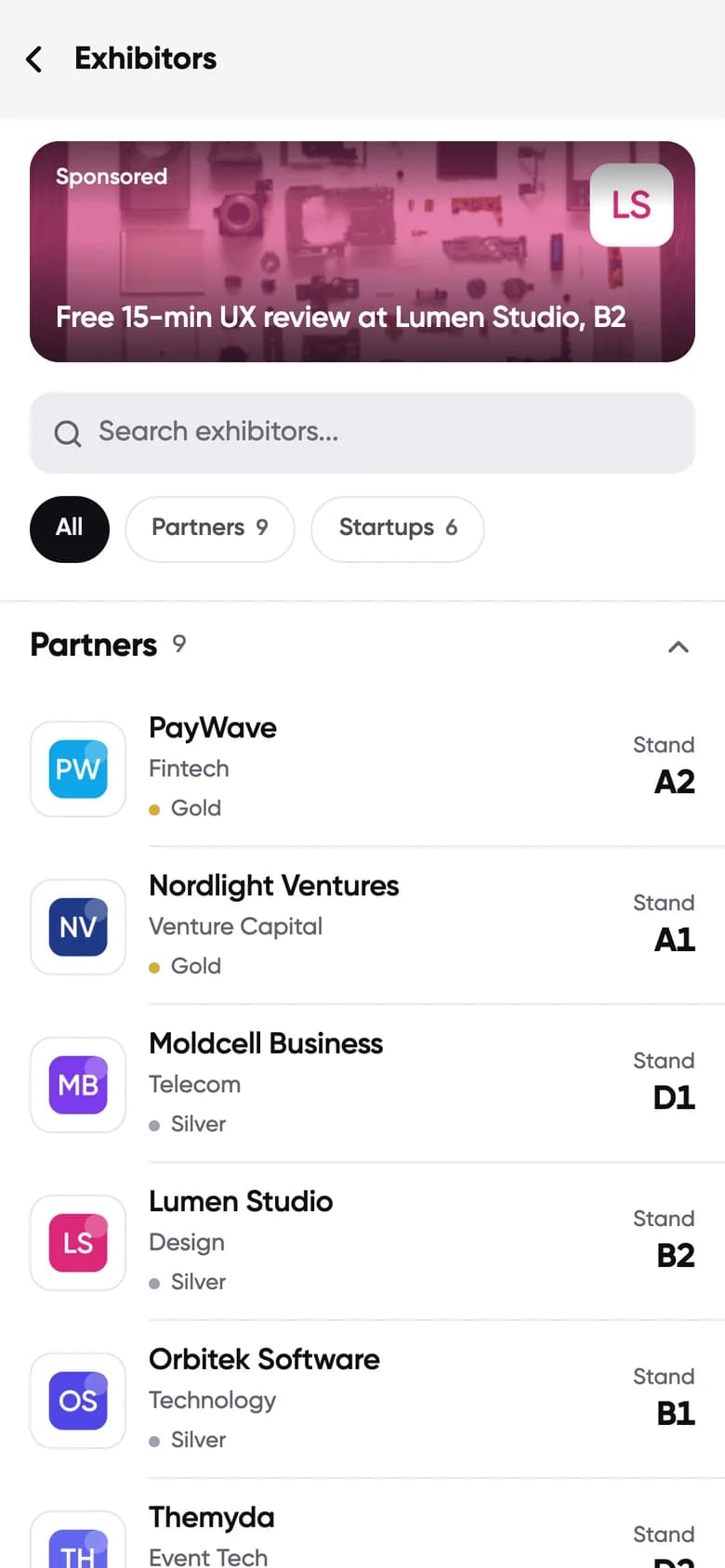 Conecta Exhibitors screen: partners and startups with their stand numbers and a sponsored placement